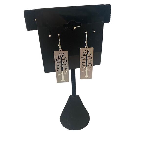Simple beauty is defined in these Muted Silver Toned Rectangular Drop Earrings. - Picture 2 of 5